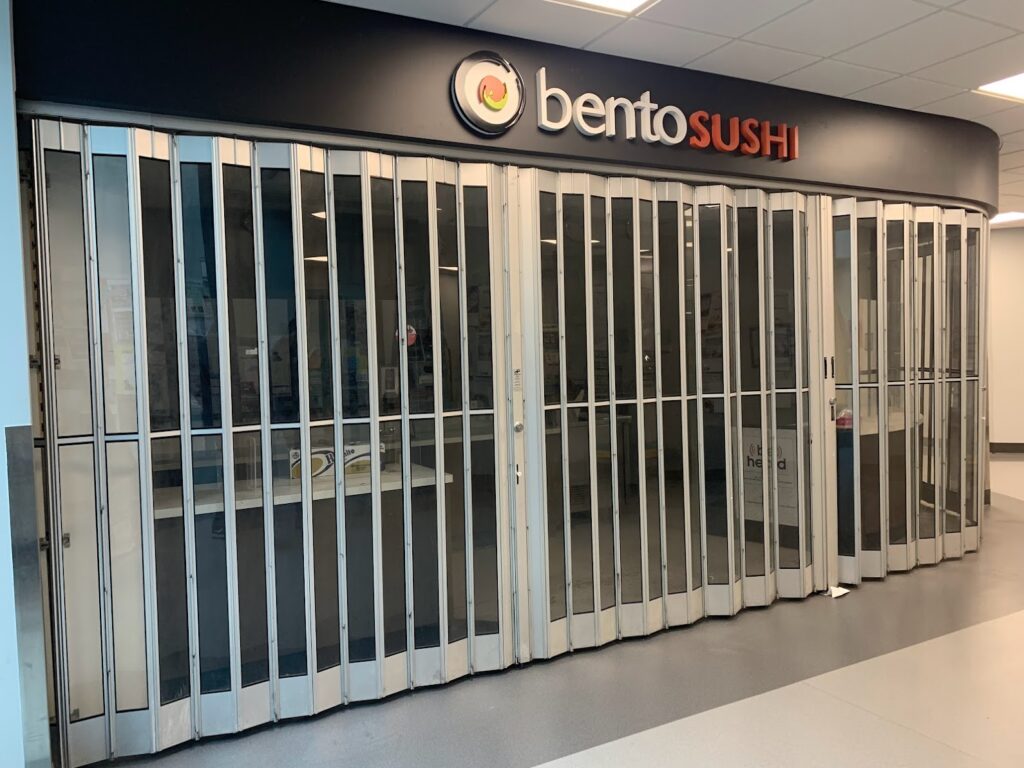 The doors to Bento Sushi, closed and dark